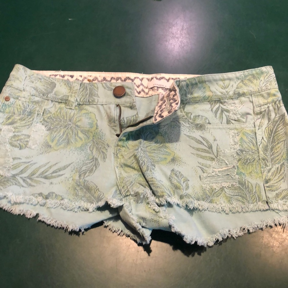 Vintage 2000s O’Neill short shorts. Size 7. Blue and green floral print